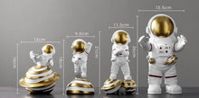 Load image into Gallery viewer, Astronaut on Planet Saturn