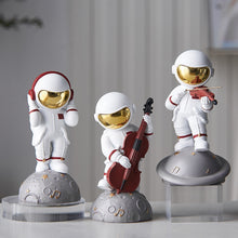 Load image into Gallery viewer, Astronaut Band Figurine