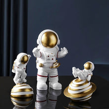 Load image into Gallery viewer, Astronaut on Planet Saturn