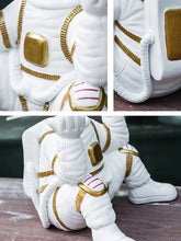 Load image into Gallery viewer, Big Planet Astronaut Sculpture
